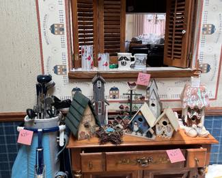 cabinet, bird houses, golf clubs