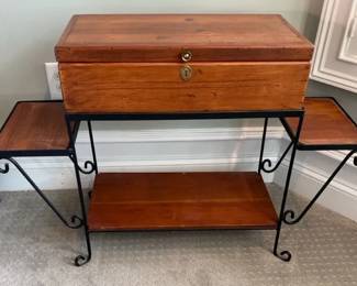 Vintage Pine Wood Box With Keyhole Resets On A Wrought Iron Stand With Side Shelfs On Side