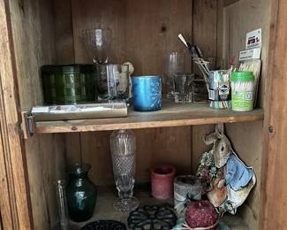 065 cabinetlotcandlesvasesdecor