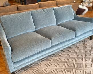 velvet sofa with leather welt detail