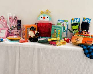Kids books, games, and toys. Dog toys + costumes