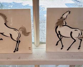 Japanese wood block print images on ceramic tiles.