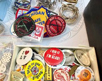 Vintage pinbacks and patches.