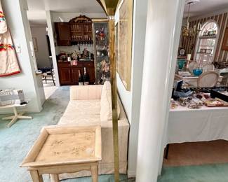 Post modern brass and lucite floor lamp.