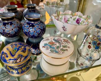 Cabinet full of beautiful decor.