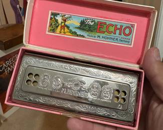 Multiple M Hohner harmonicas