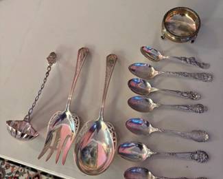 Sterling silver flatware and travel spoons