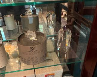 Swarovski crystal pieces with their original boxes
