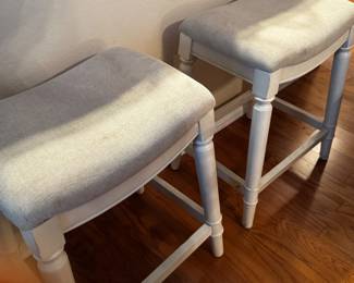 2 White Upholstered Counter Stools