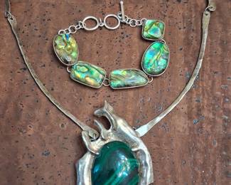 Giant malachite and sterling pendant on 4 link chain made by local artist.
