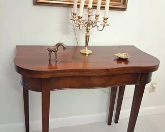 Great federalist serpentine folding table and Baldwin brass candelabra