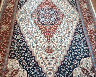 Large hand made wool blend Persian rugs