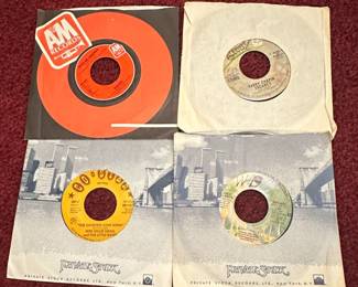 Assorted Vintage 7-inch Vinyl Records: Falco, Harry Chapin, Wee Willie Small, Randy Newman