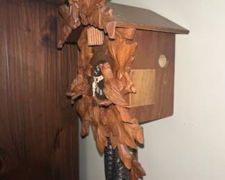 Black Forest Style Cuckoo Clock with Bird and Leaf Motifs