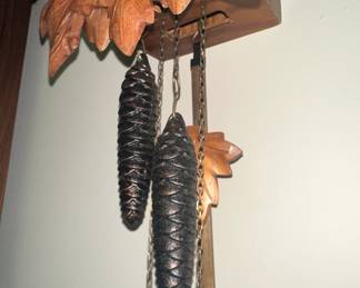 Black Forest Style Cuckoo Clock with Bird and Leaf Motifs