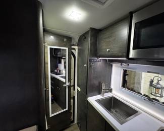 nucamp truck camper kitchen and storage space