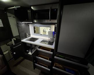 nucamp truck camper kitchen and storage space 