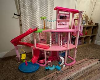 - barbie’s dream house w/ barbie car $100