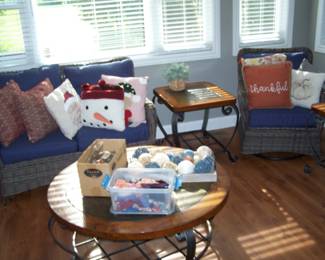 RATTAN SETTEE & SWIVEL CHAIR, DECORATOR PILLOWS, COFFEE TABLE & LAMP TABLE