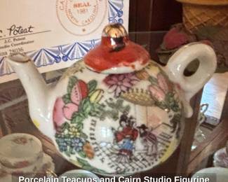 Porcelain Teacups and Cairn Studio Figurine second image