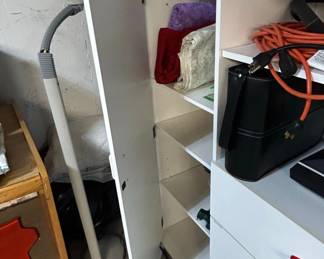 Modern White Utility Storage Cabinet with MultiColored Handles second image