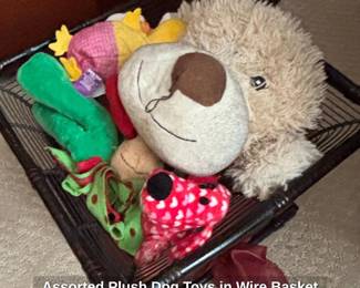 Assorted Plush Dog Toys in Wire Basket