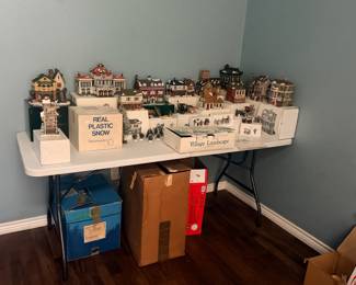 Selling a beautiful, instant-setup collection of vintage Department 56 Christmas Village buildings and landscaping accessories. This entire lot has been meticulously cared for and is ready to create a spectacular holiday display. It features premium porcelain lighted structures from iconic series like the Original Snow Village and Dickens' Village.Perfect for a collector looking to expand their layout or a family wanting to start a nostalgic holiday tradition!