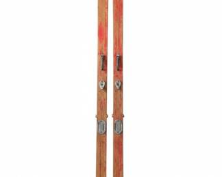 Vintage Wooden Skis with Red Accents and Cable Bindings