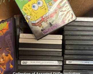 Collection of Assorted DVDs including ScoobyDoo, SpongeBob, The Tudors, and The Lion, the Witch and the Wardrobe
