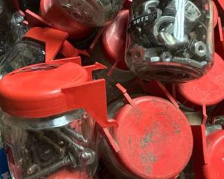 Hardware Collection in Vintage Jars with Red Lids second image