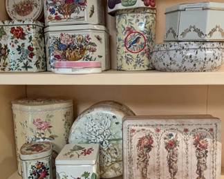 Vintage Decorative Tins Collection with Floral, Fruit, and Cherub Motifs