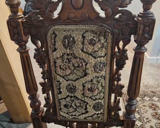 Antique Neo-Renaissance revival highback chair. Hand carved Oak wood detail. Late 19th century. Wood is excellent and fabric needs to be reupholstered. Cost $125