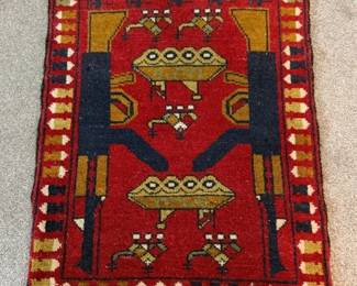 Dimensions: 1’5” x 2’4” Description: Vintage Afghan war rug. Hand knotted, 100% wool rug Design: Typically featuring motif like tanks, rifles, planes on red field. Often depicting military equipment from Soviet Afghan war era or later conflicts.  Color: red, navy, gold multi. Price: $150