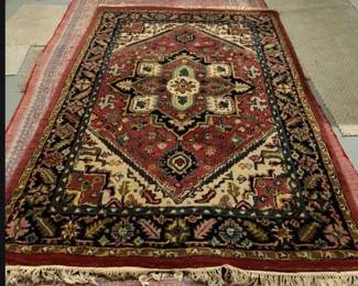 Dimensions: 5’ 7” x 3’ 6” Description: Vintage Iranian Heriz (replica) handmade wool rug Design: Geometric Heriz or Bakhtiara design Color: Maroon, black, multi Origin: India or Pakistan  Price:$250