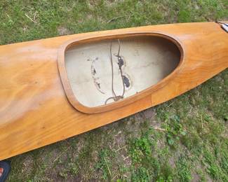 16 foot custom made wooden Kayak with 2 storage compartment with paddles $600