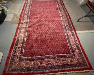 Dimensions: 9’11” x 5’9” Description: Vintage Sarouk runner. Hand knotted wool rug.  Colors: Deep red, beige, gray and navy Pattern: Distinctive boteh (paisley) design throughout the main field. Age is estimated between 60-75 years old Price: $500