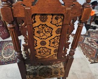 Antique Neo-Renaissance revival highback chair. Hand carved Oak wood detail. Late 19th century. Wood is excellent and fabric needs to be reupholstered. Cost $125