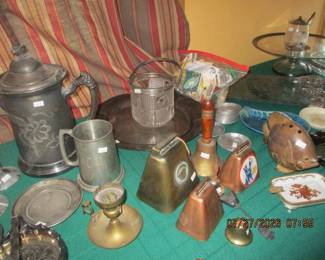 Silverplate, brass and copper toned cow bells