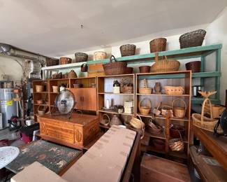 Baskets galore, bookcases, benches, stoneware 