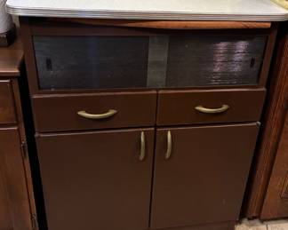 Metal Cabinet. Formica Top. Glass sliding doors