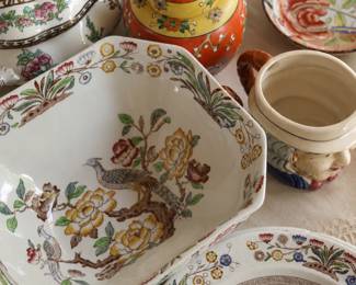 A large assortment of dishware, ranging from antique china and vintage patterns