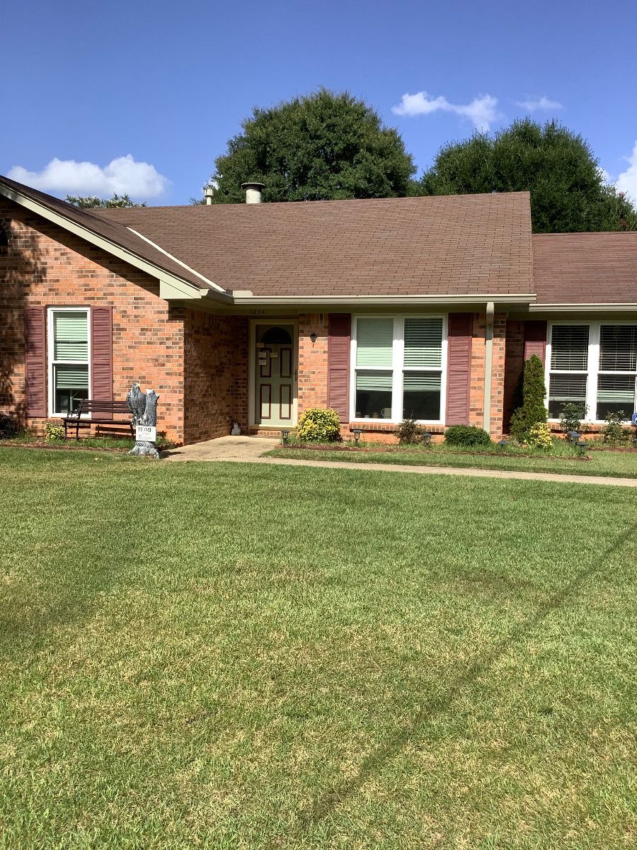 The front of the beautiful house for sale.