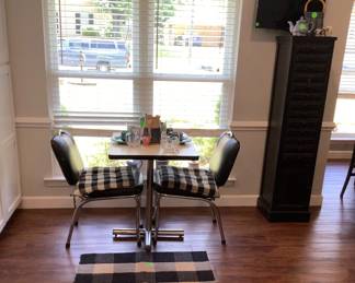 The close up of the black 50’s, 60’s table & 2 chairs.  Price:  130.00