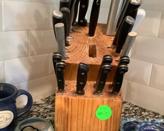 Knives and wood knife holder.