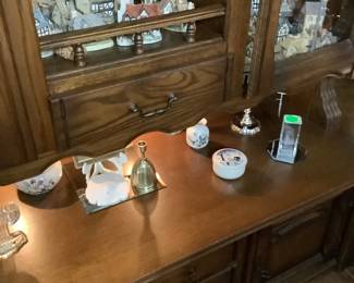 This 4 section cabinet is full of David Winters collectible cottages.