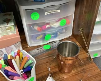 Items and supplies in desk.