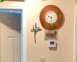Clock and metal cross.