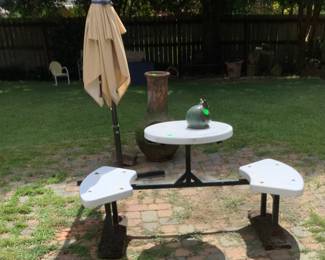 Large umbrella with stand that tilts.  Price: 180.00