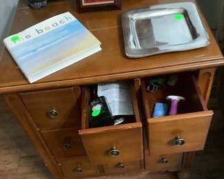 6 drawer end table by couch. 