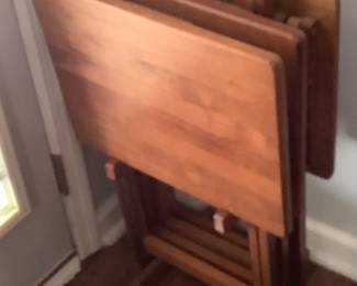 Wood TV trays in stand.